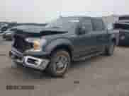 2019 Ford F-150 XLT with VIN 1FTEW1EP1KFA92980, listed as a Copart auction lot 84297305 with 127,374 mi miles and Salvage title. Bid and sale history available at DreamBid. Image 1.