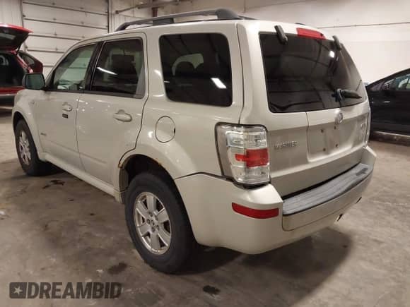 2008 Mercury Mariner with VIN 4M2CU91148KJ42603, listed as a IAAI auction lot 42311239 with 173,554 mi miles and . Bid and sale history available at DreamBid. Image 3.