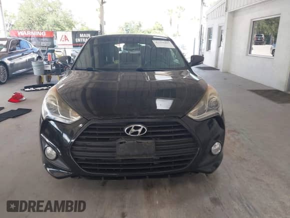 2013 Hyundai Veloster Turbo с VIN KMHTC6AEXDU167848, выставлен на аукционе IAAI как лот 43353403 с пробегом 84 077 миль миль и . История ставок и продаж доступна на DreamBid. Изображение 13.