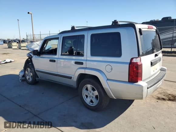 2006 Jeep Commander z VIN 1J8HH48K56C355688, wystawiony jako Copart lot #85169995 z przebiegiem 178 688 mil mil oraz Szkoda całkowita • Salvage title. Historia ofert i sprzedaży dostępna na DreamBid. Obrazek 2.
