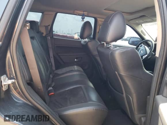 2008 Jeep Grand Cherokee SRT-8 z VIN 1J8HR78328C100958, wystawiony jako Copart lot #68022785 z przebiegiem 151 765 mil mil oraz Szkoda całkowita • Salvage title. Historia ofert i sprzedaży dostępna na DreamBid. Obrazek 10.