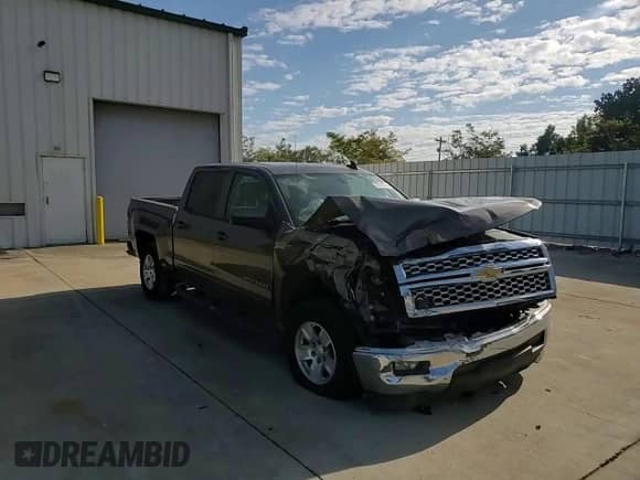 2015 Chevrolet Silverado 1500 LT z VIN 3GCPCREC8FG121635, wystawiony jako Copart lot #72019535 z przebiegiem 255 279 mil mil oraz Szkoda całkowita • Salvage title. Historia ofert i sprzedaży dostępna na DreamBid. Obrazek 13.