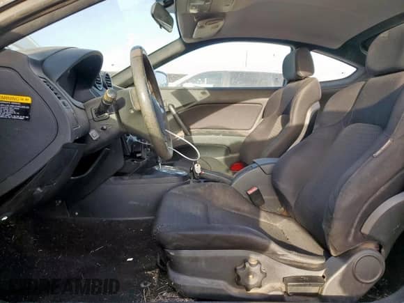 2007 Hyundai Tiburon GS с VIN KMHHM66D27U260421, выставлен на аукционе Copart как лот 48982505 с пробегом 100 045 миль миль и Чистый • Clean title. История ставок и продаж доступна на DreamBid. Изображение 7.