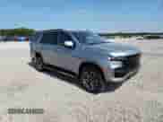 2023 Chevrolet Tahoe Z71 with VIN 1GNSKPKD0PR521471, listed as a Copart auction lot 65339615 with 57,973 mi miles and Salvage title. Bid and sale history available at DreamBid. Image 4.