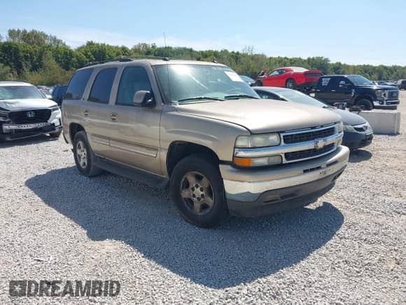 2005 Chevrolet Tahoe LT z VIN 1GNEC13T75R131512, wystawiony jako IAAI lot #43182291 z przebiegiem 231 938 mil mil oraz . Historia ofert i sprzedaży dostępna na DreamBid. Obrazek 1.