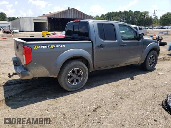 2016 Nissan Frontier Desert Runner with VIN 1N6AD0ER8GN792909, listed as a Copart auction lot 69544525 with 197,095 mi miles and Salvage title. Bid and sale history available at DreamBid. Image 3.