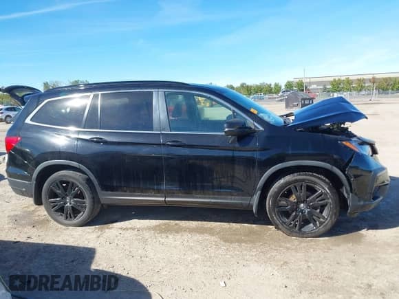 2022 Honda Pilot Special Edition with VIN 5FNYF6H28NB057646, listed as a IAAI auction lot 43356301 with 46,911 mi miles and . Bid and sale history available at DreamBid. Image 13.