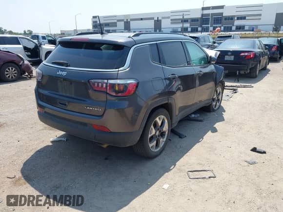 2020 Jeep Compass Limited with VIN 3C4NJCCB5LT114424, listed as a IAAI auction lot 43164924 with 99,096 mi miles and . Bid and sale history available at DreamBid. Image 4.