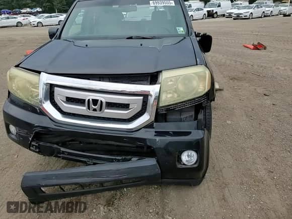 2011 Honda Pilot EX-L z VIN 5FNYF3H61BB006339, wystawiony jako Copart lot #69939555 z przebiegiem 187 937 mil mil oraz Szkoda całkowita • Salvage title. Historia ofert i sprzedaży dostępna na DreamBid. Obrazek 13.