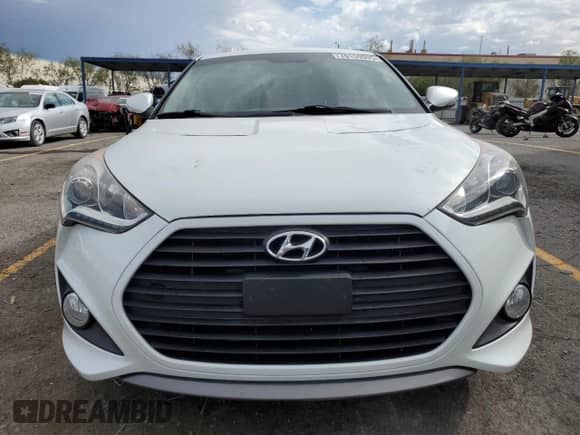 2014 Hyundai Veloster Turbo R-Spec с VIN KMHTC6AE1EU208532, выставлен на аукционе Copart как лот 70159995 с пробегом 75 844 миль миль и Списание • Salvage title. История ставок и продаж доступна на DreamBid. Изображение 5.