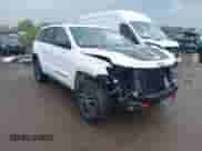 2018 Jeep Grand Cherokee Trailhawk z VIN 1C4RJFLG6JC336932, wystawiony jako IAAI lot #43272184 z przebiegiem 64 066 mil mil oraz . Historia ofert i sprzedaży dostępna na DreamBid. Obrazek 1.