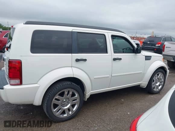 2007 Dodge Nitro R/T with VIN 1D8GU58657W732741, listed as a IAAI auction lot 42145269 with 137,796 mi miles and . Bid and sale history available at DreamBid. Image 13.