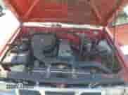 1996 Nissan Frontier XE z VIN 1N6SD16S3TC341128, wystawiony jako Copart lot #67135915 z przebiegiem 222 764 mil mil oraz Szkoda całkowita • Salvage title. Historia ofert i sprzedaży dostępna na DreamBid. Obrazek 11.
