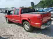 2001 Chevrolet S-10 LS with VIN 1GCDT13W71K258259, listed as a Copart auction lot 60201065 with 177,444 mi miles and Salvage title. Bid and sale history available at DreamBid. Image 2.