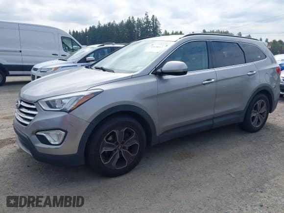 2016 Hyundai Santa Fe SE with VIN KM8SMDHF9GU162155, listed as a IAAI auction lot 43178113 with 148,621 mi miles and . Bid and sale history available at DreamBid. Image 2.