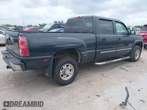 2003 Chevrolet Silverado 1500HD LS z VIN 1GCGK13U63F214778, wystawiony jako IAAI lot #42141435 z przebiegiem 161 669 mil mil oraz . Historia ofert i sprzedaży dostępna na DreamBid. Obrazek 4.