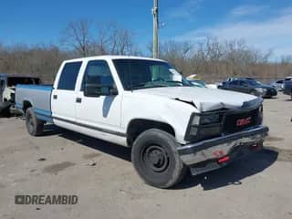 1996 GMC Sierra 1500 with VIN 1GTGC33R4TF018147, listed as a IAAI auction lot 41612770 with 106,443 mi miles and . Bid and sale history available at DreamBid. Image 1.