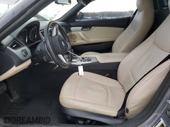 2013 BMW Z4 sDrive28i with VIN WBALL5C51DJ104731, listed as a Copart auction lot 75955854 with 77,108 mi miles and Salvage title. Bid and sale history available at DreamBid. Image 7.