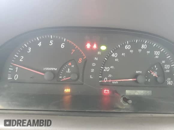 2004 Toyota Camry LE z VIN 4T1BF30KX4U569944, wystawiony jako Copart lot #81707915 z przebiegiem 246 068 mil mil oraz Szkoda całkowita • Salvage title. Historia ofert i sprzedaży dostępna na DreamBid. Obrazek 9.