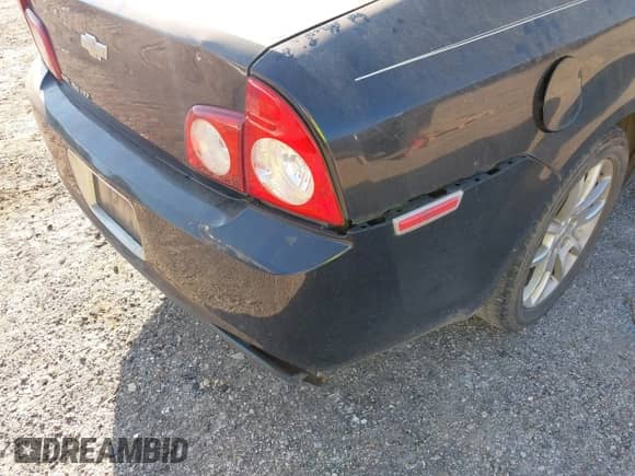 2012 Chevrolet Malibu LTZ 1LZ z VIN 1G1ZE5E07CF208739, wystawiony jako IAAI lot #43373080 z przebiegiem 157 844 mil mil oraz . Historia ofert i sprzedaży dostępna na DreamBid. Obrazek 12.