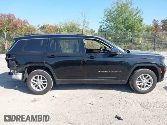 2023 Jeep Grand Cherokee Laredo with VIN 1C4RJKAG1P8887129, listed as a IAAI auction lot 43313020 with 66,250 mi miles and . Bid and sale history available at DreamBid. Image 14.