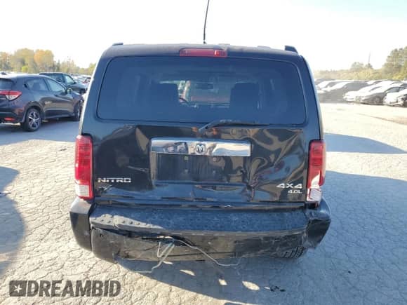 2008 Dodge Nitro R/T с VIN 1D8GU58608W137507, выставлен на аукционе Copart как лот 77184654 с пробегом 153 110 миль миль и Списание • Salvage title. История ставок и продаж доступна на DreamBid. Изображение 6.