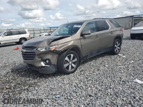2020 Chevrolet Traverse LT with VIN 1GNERHKW9LJ146236, listed as a Copart auction lot 71595675 with 135,843 mi miles and Salvage title. Bid and sale history available at DreamBid. Image 1.