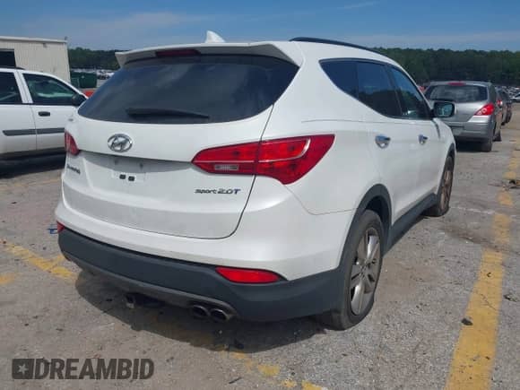 2014 Hyundai Santa Fe with VIN 5XYZU3LAXEG213640, listed as a IAAI auction lot 43119007 with 133,142 mi miles and . Bid and sale history available at DreamBid. Image 4.