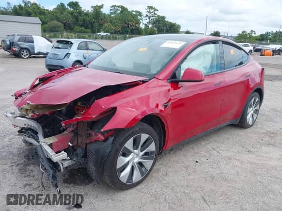 2023 Tesla Model Y Long Range with VIN 7SAYGAEE6PF777290, listed as a IAAI auction lot 43167431 with 19,758 mi miles and . Bid and sale history available at DreamBid. Image 2.