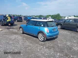 2005 MINI Hardtop S with VIN WMWRE33535TL14231, listed as a IAAI auction lot 42642559 with 91,497 mi miles and . Bid and sale history available at DreamBid. Image 3.