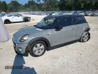 2015 MINI Hardtop with VIN WMWXM5C50FT973049, listed as a Copart auction lot 70634695 with 100,622 mi miles and Salvage title. Bid and sale history available at DreamBid. Image 1.