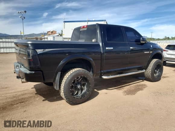 2009 Dodge 1500 SLT with VIN 1D3HV13T49S701990, listed as a Copart auction lot 71751305 with 185,287 mi miles and Non repairable. Bid and sale history available at DreamBid. Image 3.