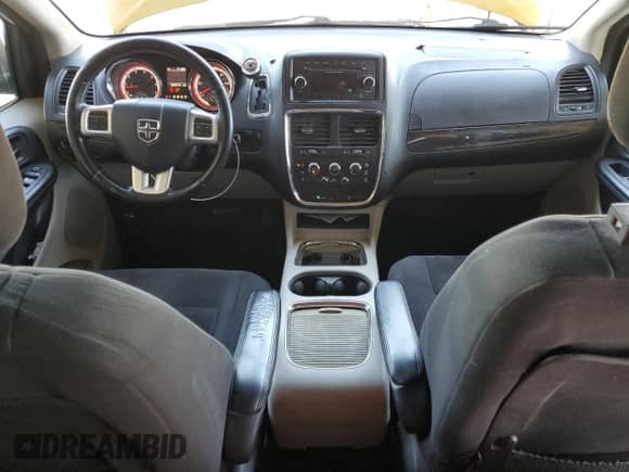 2015 Dodge Grand Caravan SXT с VIN 2C4RDGCG0FR718272, выставлен на аукционе Copart как лот 82277835 с пробегом 320 647 миль миль и Чистый • Clean title. История ставок и продаж доступна на DreamBid. Изображение 8.