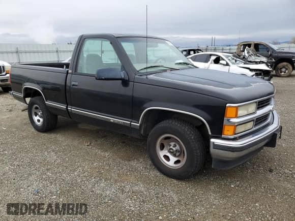 1997 Chevrolet Silverado 1500 with VIN 1GCEC14R5VZ187489, listed as a Copart auction lot 87211824 with 211,353 mi miles and Clean title. Bid and sale history available at DreamBid. Image 4.