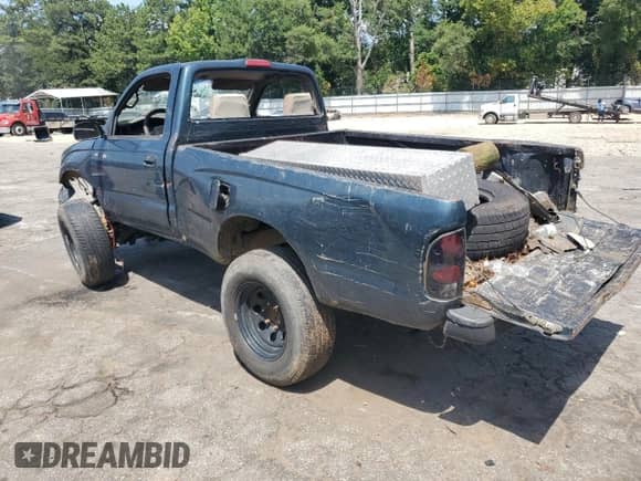 1998 Toyota Tacoma z VIN 4TAPM62N3WZ098830, wystawiony jako Copart lot #64984913 z przebiegiem 236 102 mil mil oraz Szkoda całkowita • Salvage title. Historia ofert i sprzedaży dostępna na DreamBid. Obrazek 2.