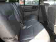 2003 Chevrolet TrailBlazer EXT LT z VIN 1GNET16S836143072, wystawiony jako Copart lot #60919665 z przebiegiem 150 946 mil mil oraz Szkoda całkowita • Salvage title. Historia ofert i sprzedaży dostępna na DreamBid. Obrazek 11.