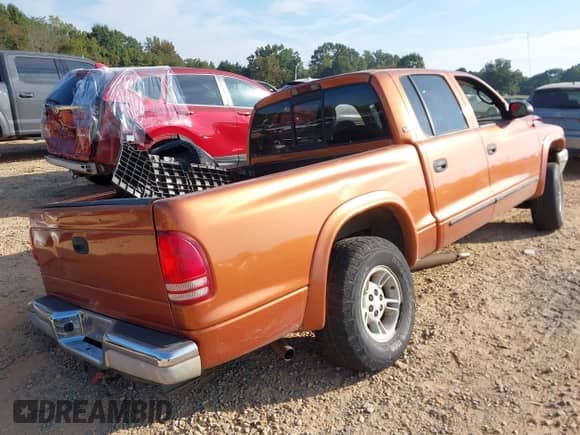 2000 Dodge Dakota with VIN 1B7GG2AX8YS720132, listed as a IAAI auction lot 43274898 with 139,546 mi miles and . Bid and sale history available at DreamBid. Image 4.