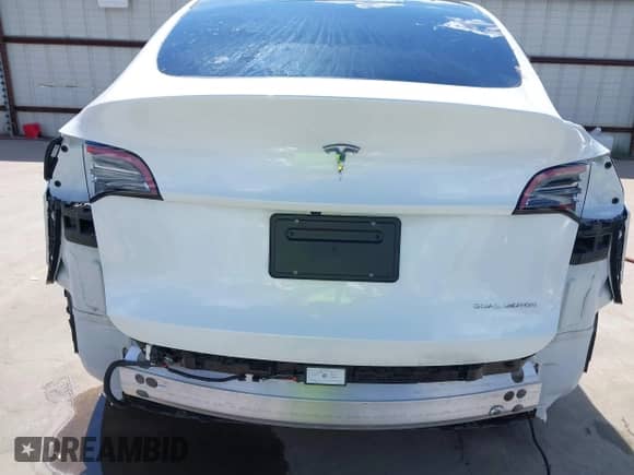 2023 Tesla Model Y Long Range with VIN 7SAYGDEE6PA078790, listed as a IAAI auction lot 43261075 with 20,370 mi miles and . Bid and sale history available at DreamBid. Image 22.