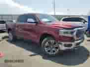 2019 Ram 1500 Longhorn with VIN 1C6SRFKT2KN911503, listed as a Copart auction lot 64874055 with 146,428 mi miles and Salvage title. Bid and sale history available at DreamBid. Image 4.