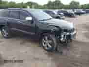 2014 Jeep Grand Cherokee Limited z VIN 1C4RJFBG6EC589188, wystawiony jako IAAI lot #43290881 z przebiegiem 148 318 mil mil oraz . Historia ofert i sprzedaży dostępna na DreamBid. Obrazek 6.