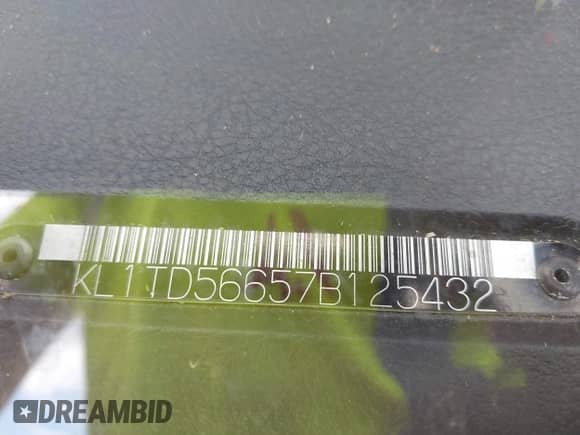 2007 Chevrolet Aveo LS with VIN KL1TD56657B125432, listed as a IAAI auction lot 43201788 with 102,474 mi miles and . Bid and sale history available at DreamBid. Image 9.