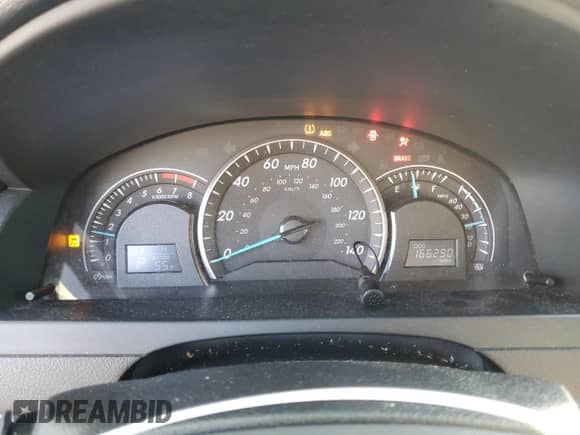 2012 Toyota Camry L z VIN 4T1BF1FK1CU579031, wystawiony jako Copart lot #82531385 z przebiegiem 166 290 mil mil oraz Szkoda całkowita • Salvage title. Historia ofert i sprzedaży dostępna na DreamBid. Obrazek 9.