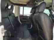 2022 Jeep Wrangler Unlimited Sahara Altitude с VIN 1C4HJXEG1NW254593, выставлен на аукционе Copart как лот 64974425 с пробегом 50 215 миль миль и Списание • Salvage title. История ставок и продаж доступна на DreamBid. Изображение 10.