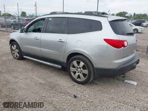2009 Chevrolet Traverse LTZ with VIN 1GNEV33D69S116223, listed as a IAAI auction lot 43086427 with 172,790 mi miles and . Bid and sale history available at DreamBid. Image 3.