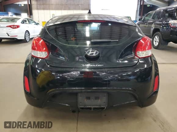 2013 Hyundai Veloster w/Black Int z VIN KMHTC6AD3DU111385, wystawiony jako Copart lot #86124085 z przebiegiem 144 014 mil mil oraz Czysty tytuł • Clean title. Historia ofert i sprzedaży dostępna na DreamBid. Obrazek 6.