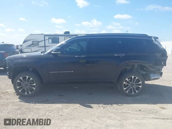 2023 Jeep Grand Cherokee Overland z VIN 1C4RJKDG5P8771928, wystawiony jako IAAI lot #42602996 z przebiegiem 32 691 mil mil oraz . Historia ofert i sprzedaży dostępna na DreamBid. Obrazek 15.