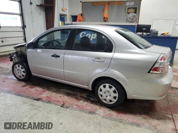 2009 Chevrolet Aveo LS с VIN KL1TD56E79B317607, выставлен на аукционе Copart как лот 84803254 с пробегом 84 242 миль миль и Списание • Salvage title. История ставок и продаж доступна на DreamBid. Изображение 2.