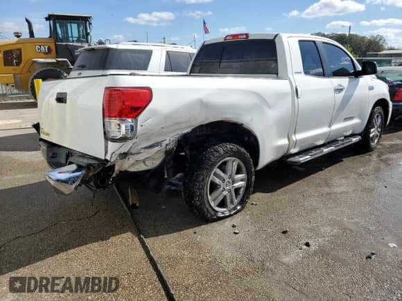2012 Toyota Tundra Limited z VIN 5TFSY5F13CX128131, wystawiony jako Copart lot #78947464 z przebiegiem 132 206 mil mil oraz Szkoda całkowita • Salvage title. Historia ofert i sprzedaży dostępna na DreamBid. Obrazek 3.