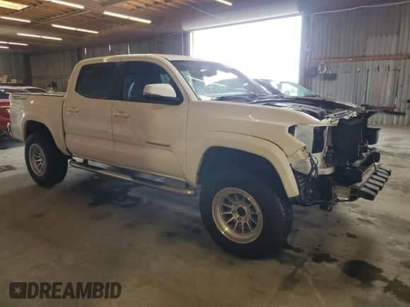 2017 Toyota Tacoma SR5 с VIN 3TMAZ5CN8HM030774, выставлен на аукционе Copart как лот 86516855 с пробегом 134 007 миль миль и Списание • Salvage title. История ставок и продаж доступна на DreamBid. Изображение 4.