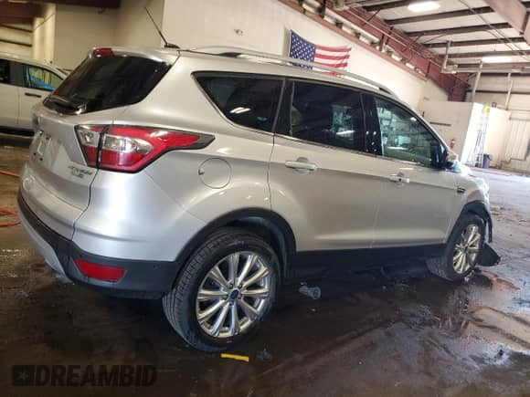 2017 Ford Escape Titanium with VIN 1FMCU9JD1HUA79587, listed as a Copart auction lot 84209285 with 61,058 mi miles and Clean title. Bid and sale history available at DreamBid. Image 3.
